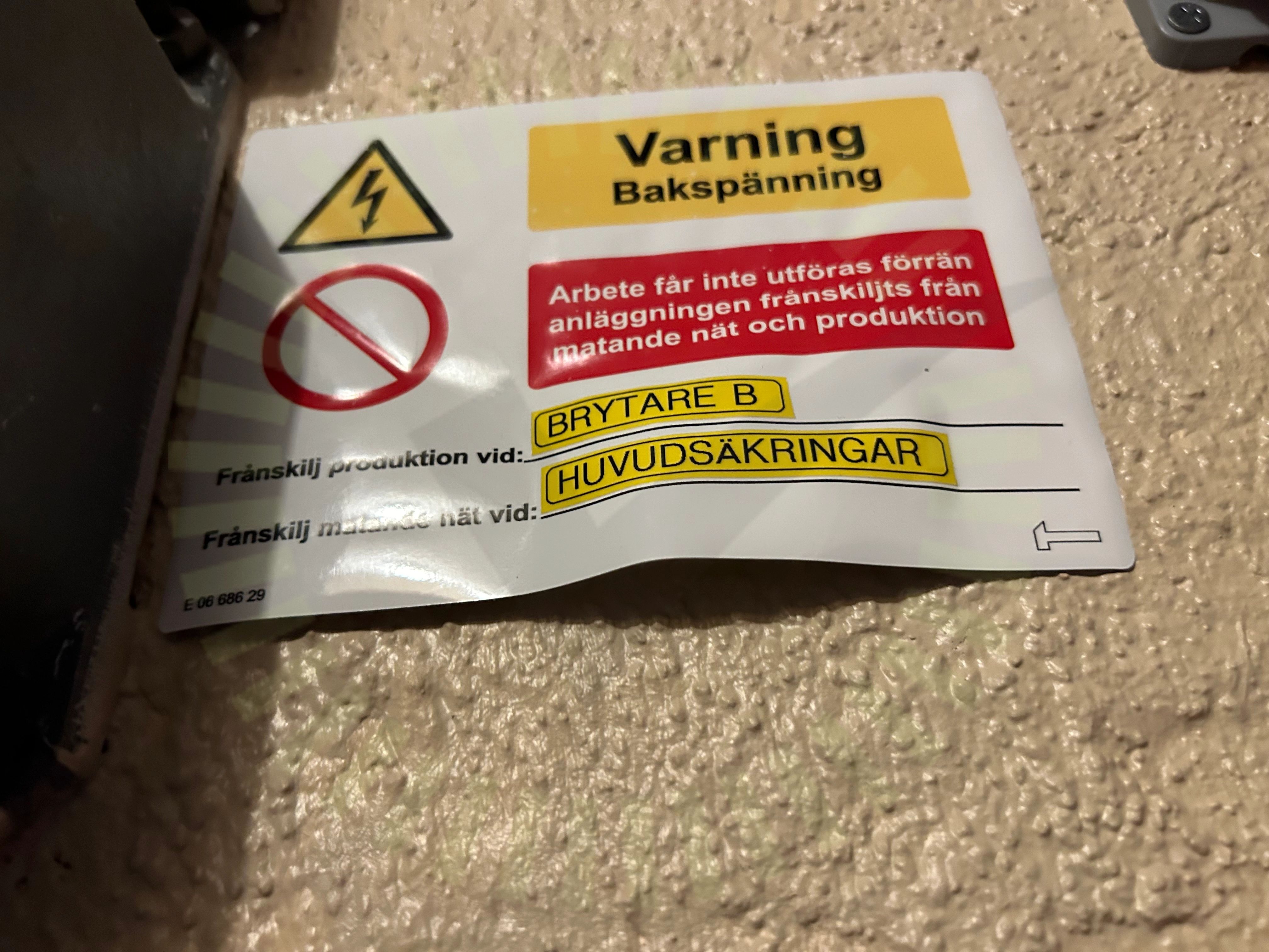 Varning för backspänning