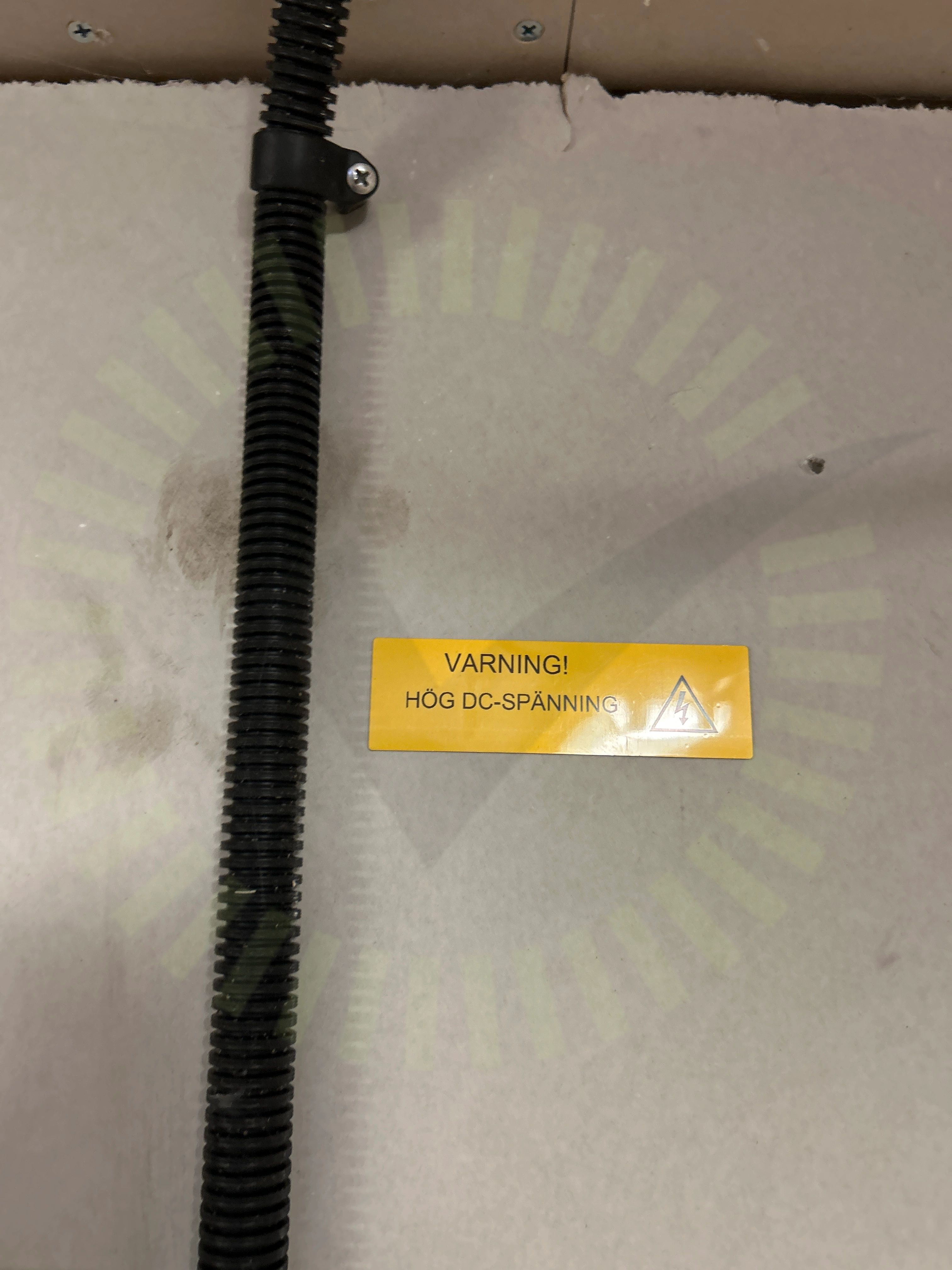 Varning för likspänning
